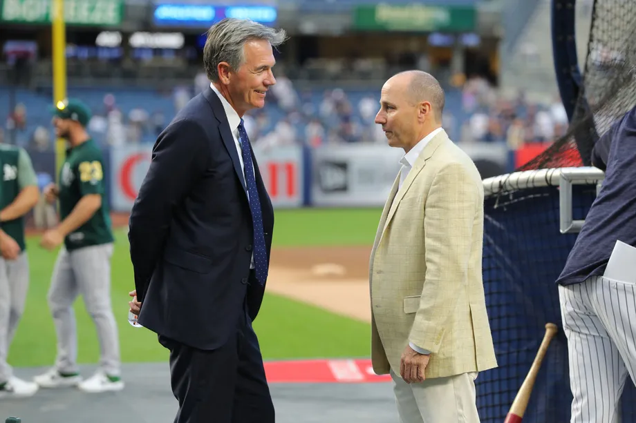 Brian Cashman and Billy Beane (GETTY IMAGES)